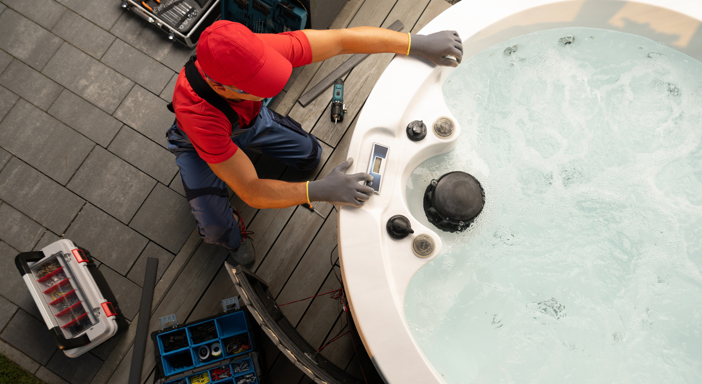 Caucasian Home SPA Technician in His 40s Performing Hot Tube Repair